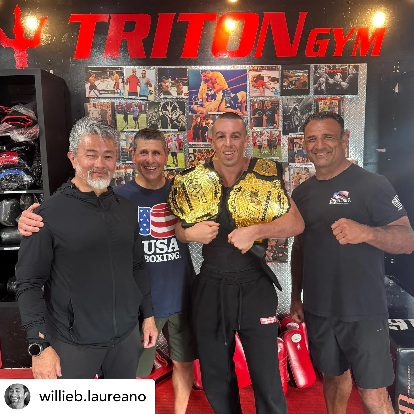 Tommy Aaron with coaches and championship belts at Triton Gym